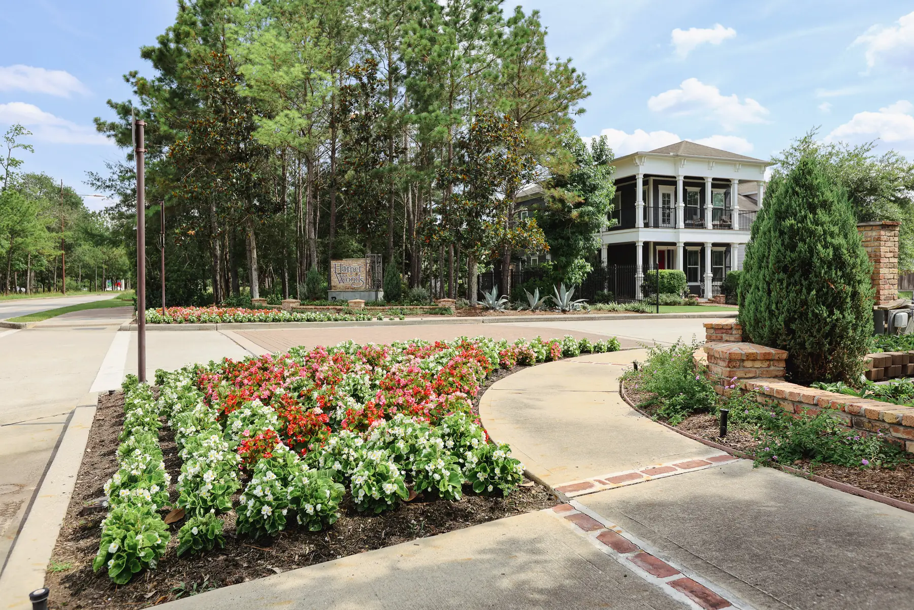 Seasonal color bed at a community entrance drive