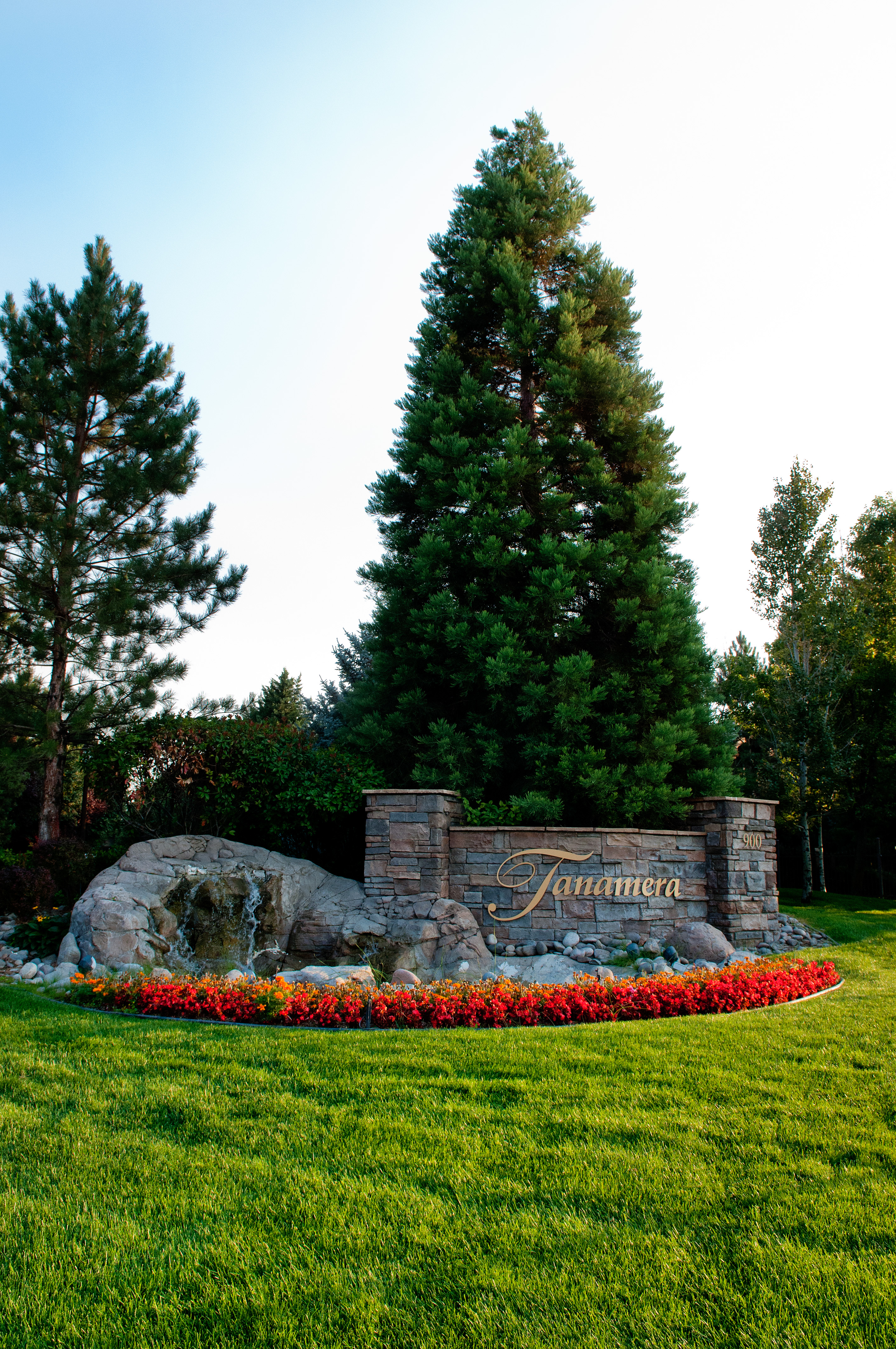 Entry monument landscaping with seasonal color
